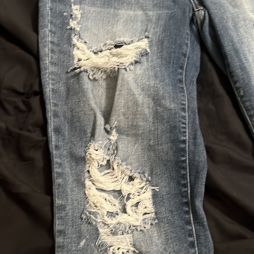Judy Blue Boyfriend-heavy distressed jeans with bleach splash